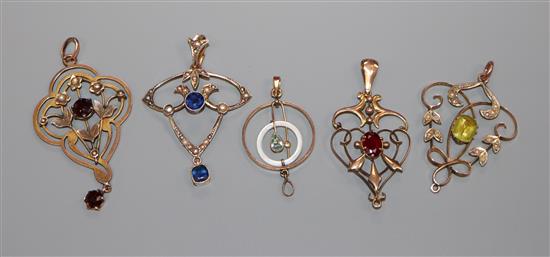 Five assorted early 20th century 9ct gold or yellow metal gem set pendants.